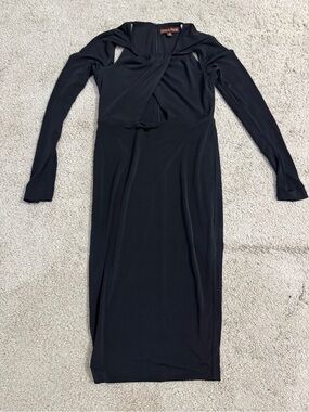 Black Long Sleeve Midi Dress by Dance Marvel. Pretty cut outs